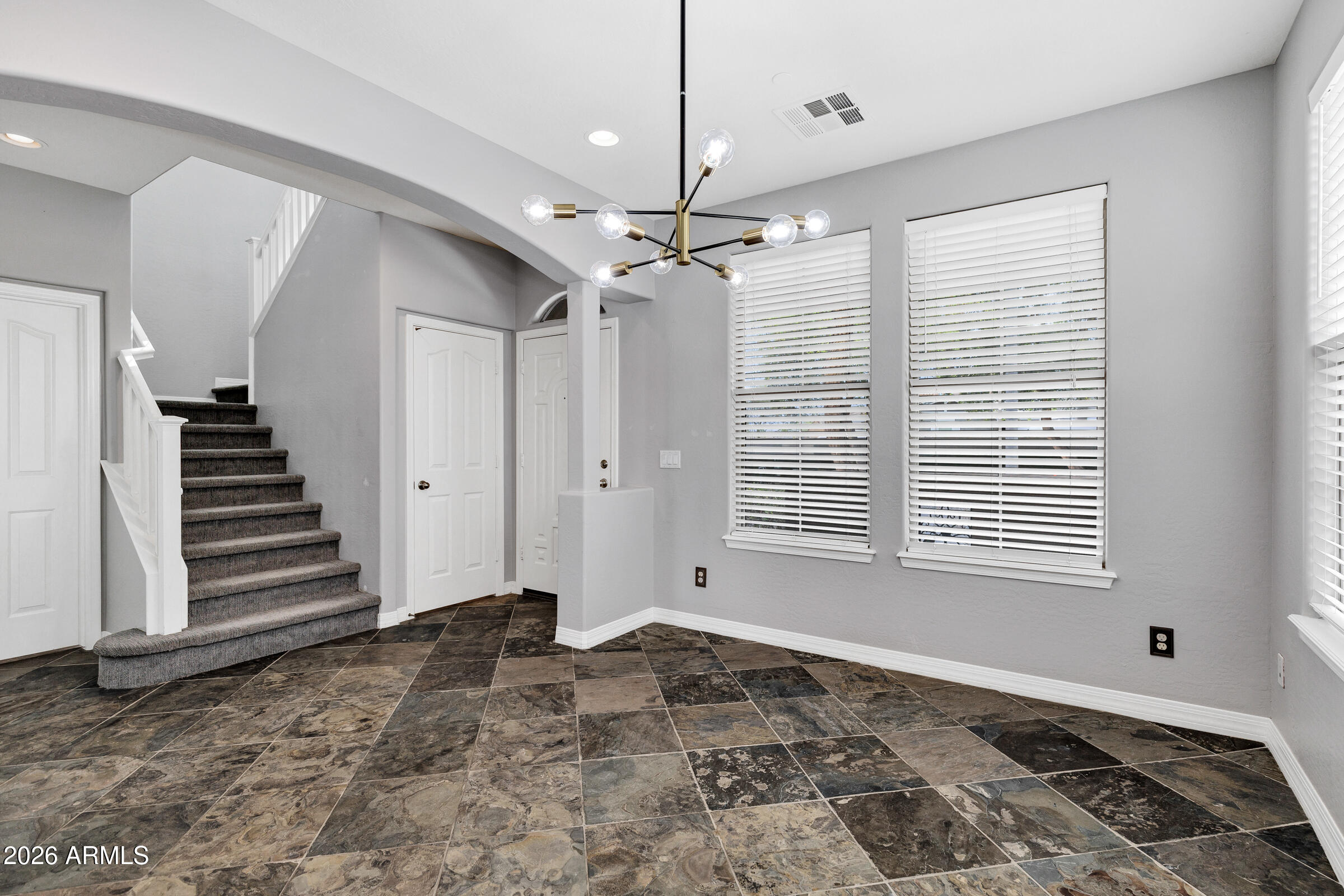 20982 West Edith Way Buckeye, AZ 85396 - Photo 8 of 57 a view of an empty room with a window