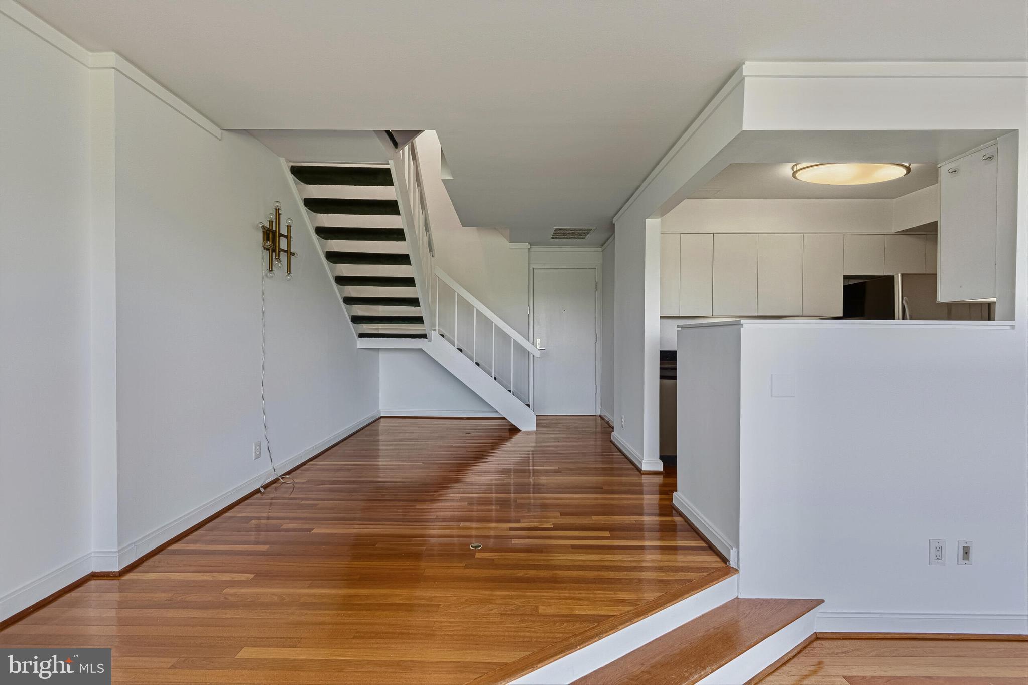 2501 M Street Northwest, Unit 722 Washington, DC 20037 - Photo 5 of 26 Gorgeous Hard Wood Floors Throughout