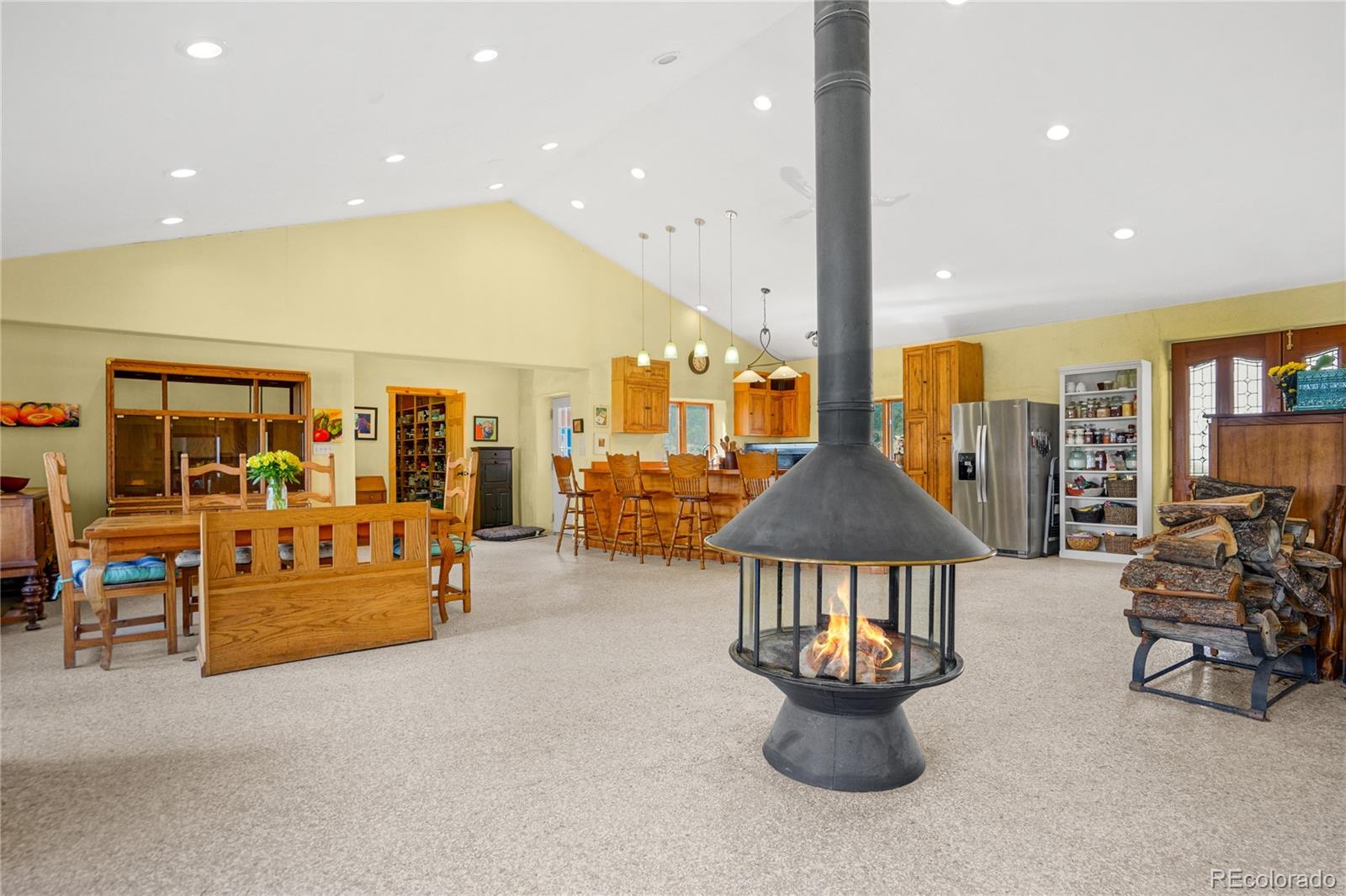 13045 Picketwire Road Boncarbo, CO 81024 - Photo 11 of 40 a living room with furniture and a table