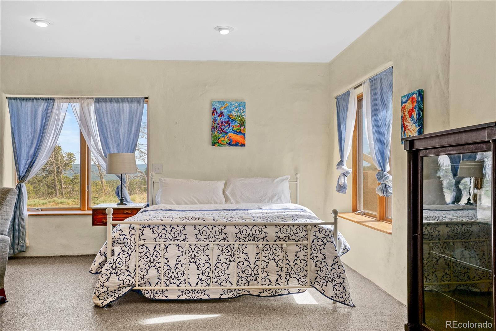 13045 Picketwire Road Boncarbo, CO 81024 - Photo 15 of 40 a bedroom with a bed and a window