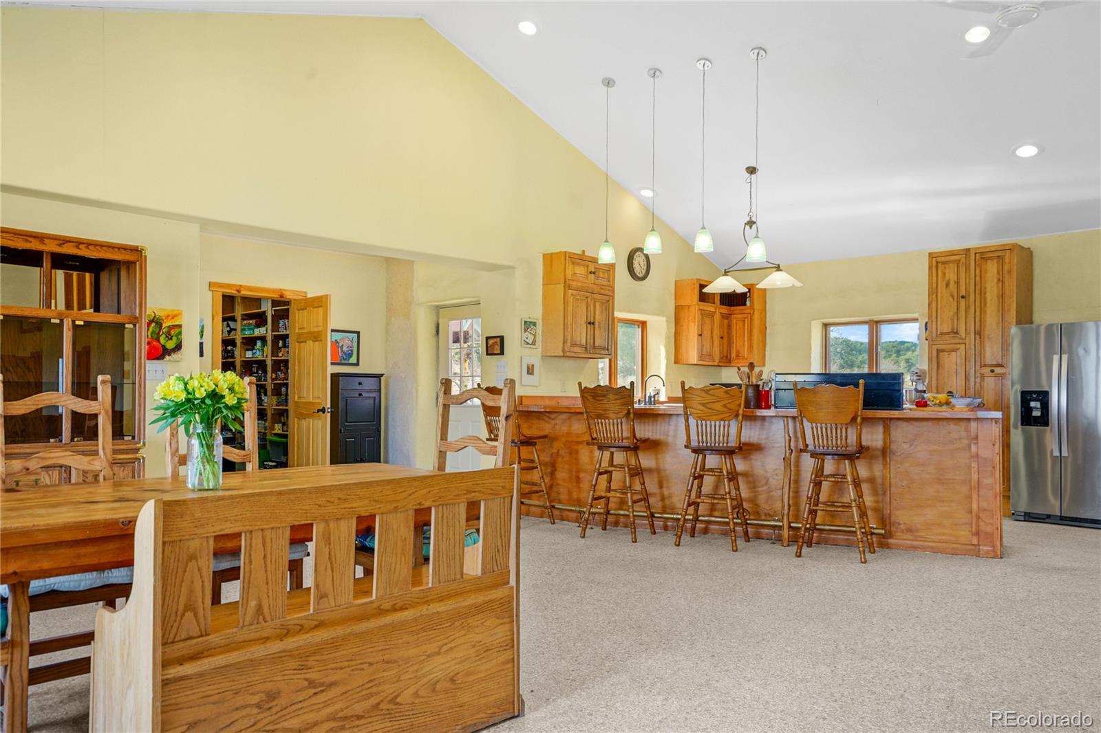13045 Picketwire Road Boncarbo, CO 81024 - Photo 17 of 40 a very nice looking dining room with many windows