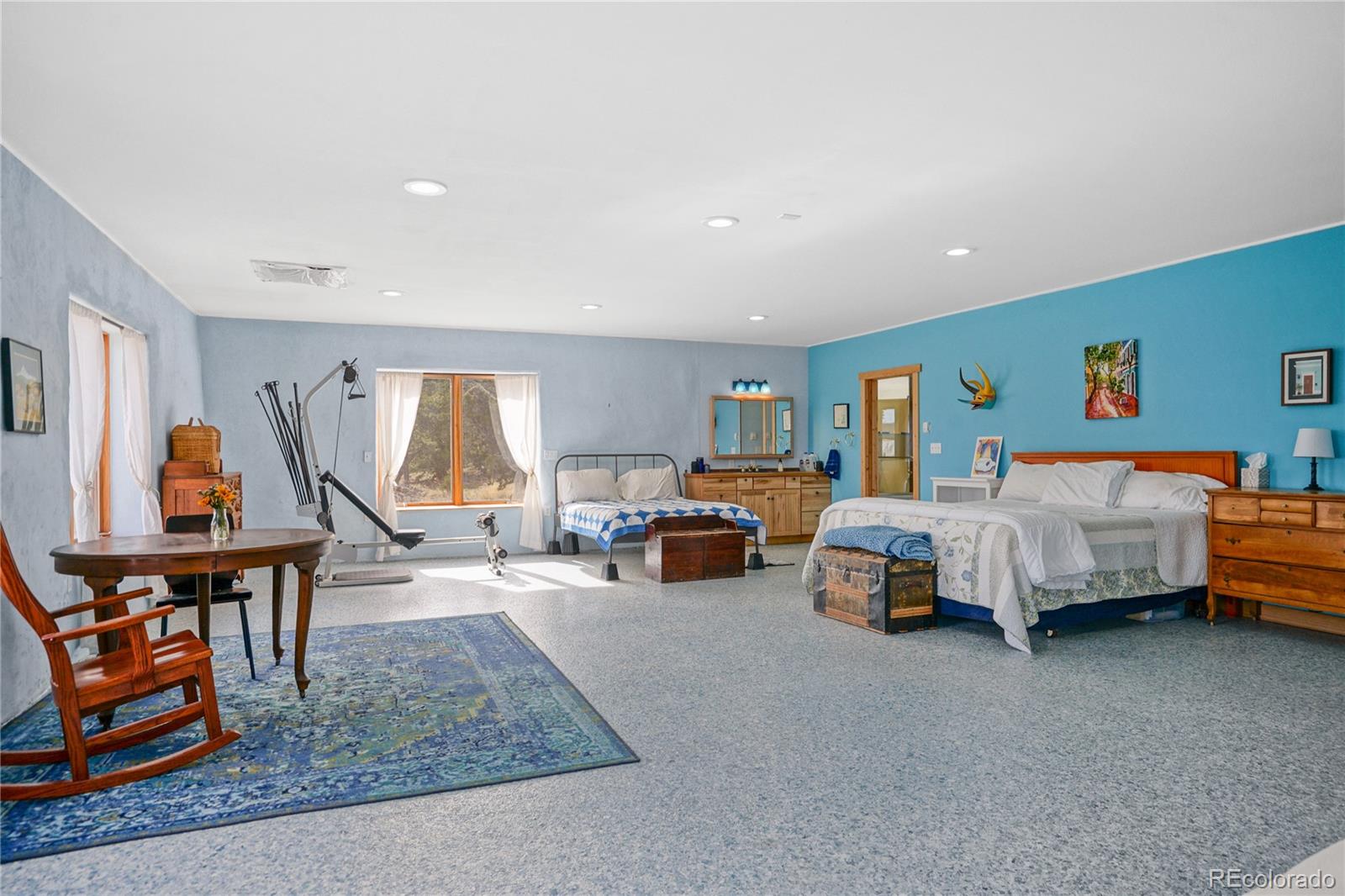 13045 Picketwire Road Boncarbo, CO 81024 - Photo 23 of 40 a bedroom with furniture and a window