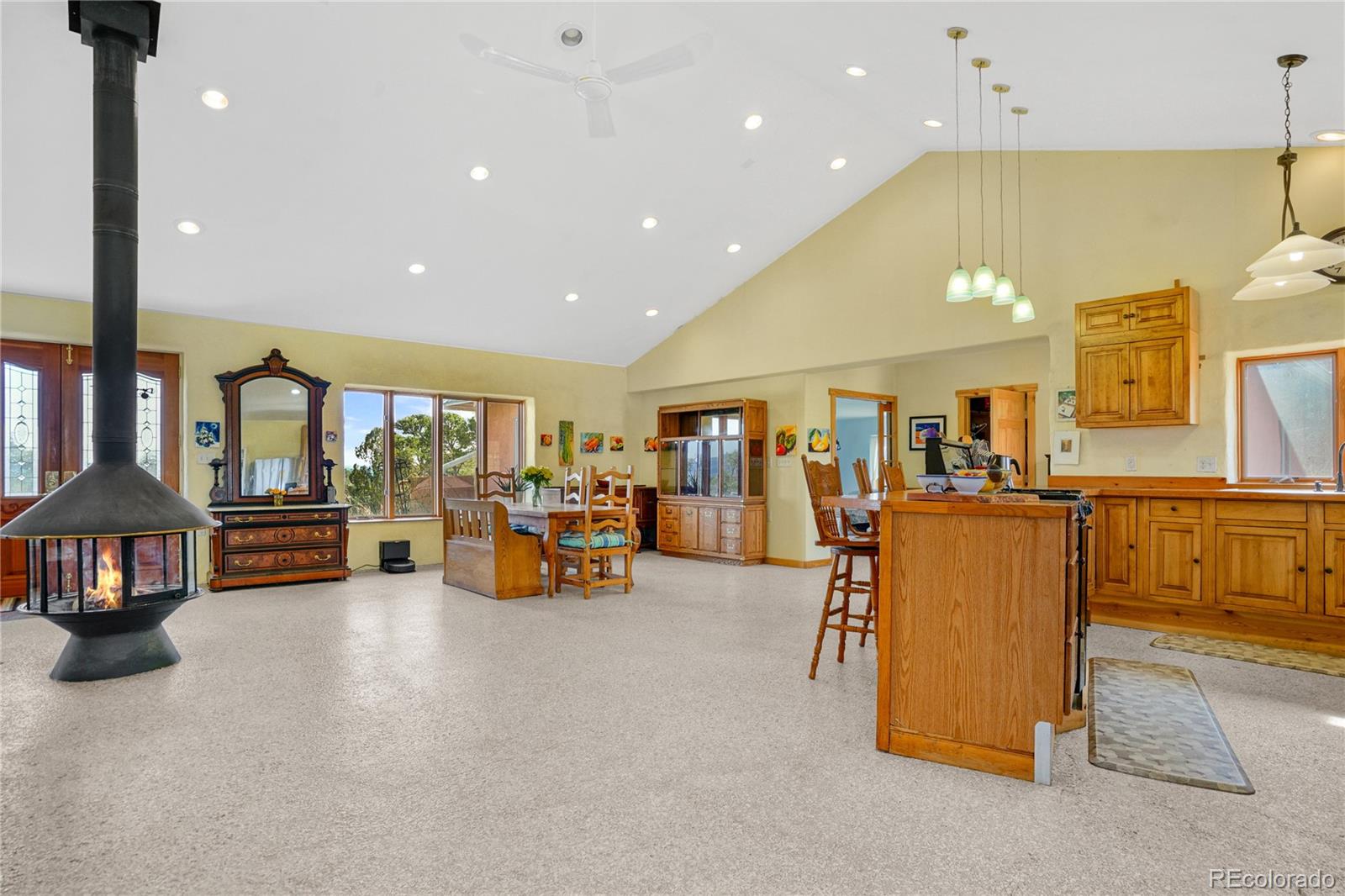 13045 Picketwire Road Boncarbo, CO 81024 - Photo 4 of 40 a living room with furniture and a flat screen tv