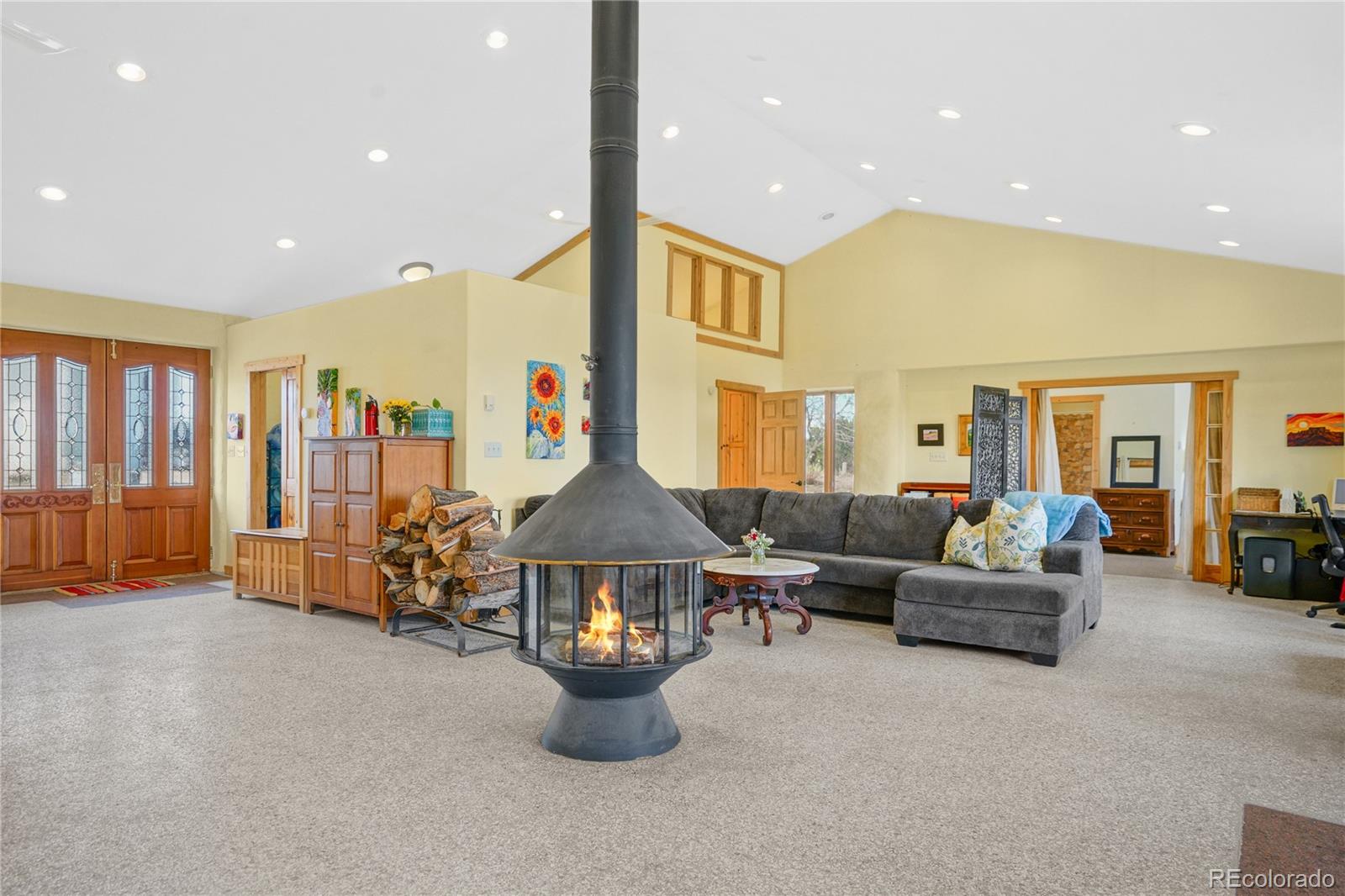 13045 Picketwire Road Boncarbo, CO 81024 - Photo 9 of 40 a living room with furniture and a potted plant