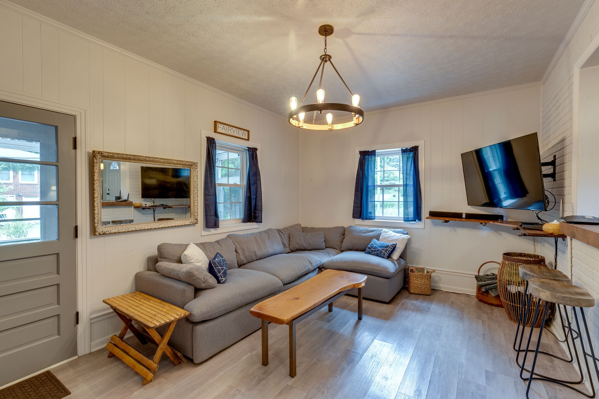 7316 Chester Road Fairview, TN 37062 - Photo 12 of 29 a living room with furniture a flat screen tv and a window