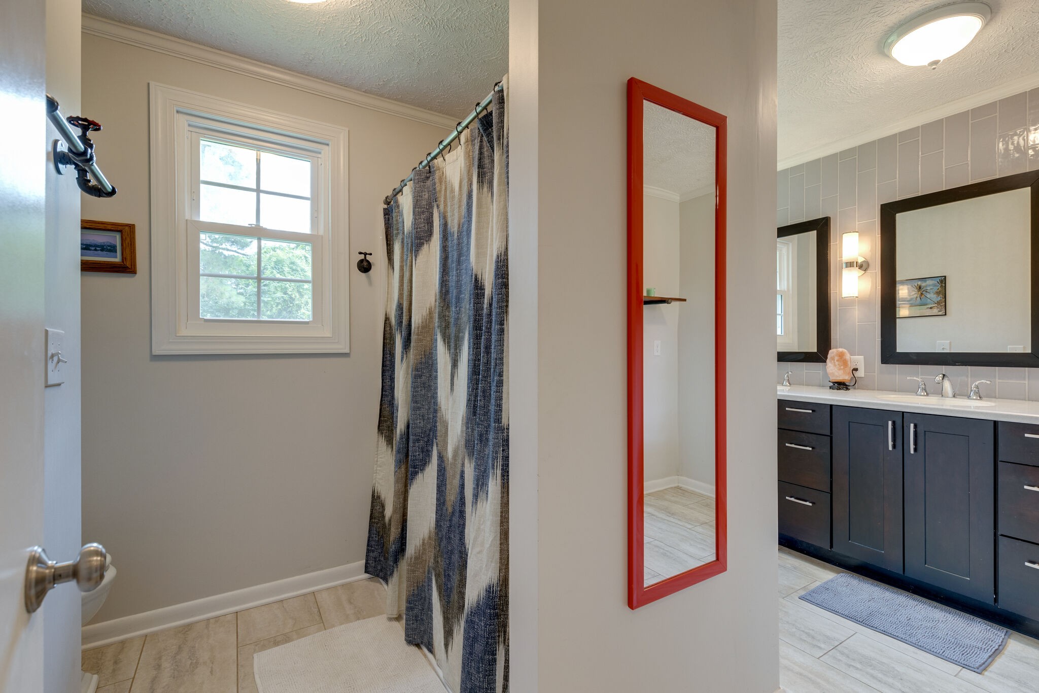 7316 Chester Road Fairview, TN 37062 - Photo 21 of 29 a bathroom with a sink and a mirror