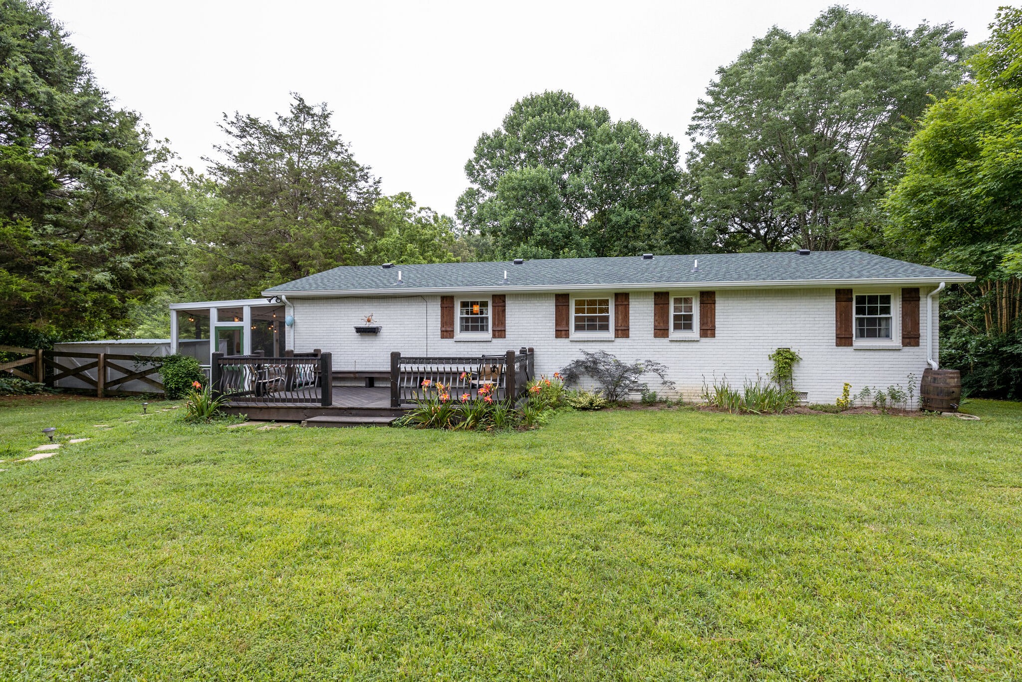 7316 Chester Road Fairview, TN 37062 - Photo 29 of 29 a view of a house with backyard and porch