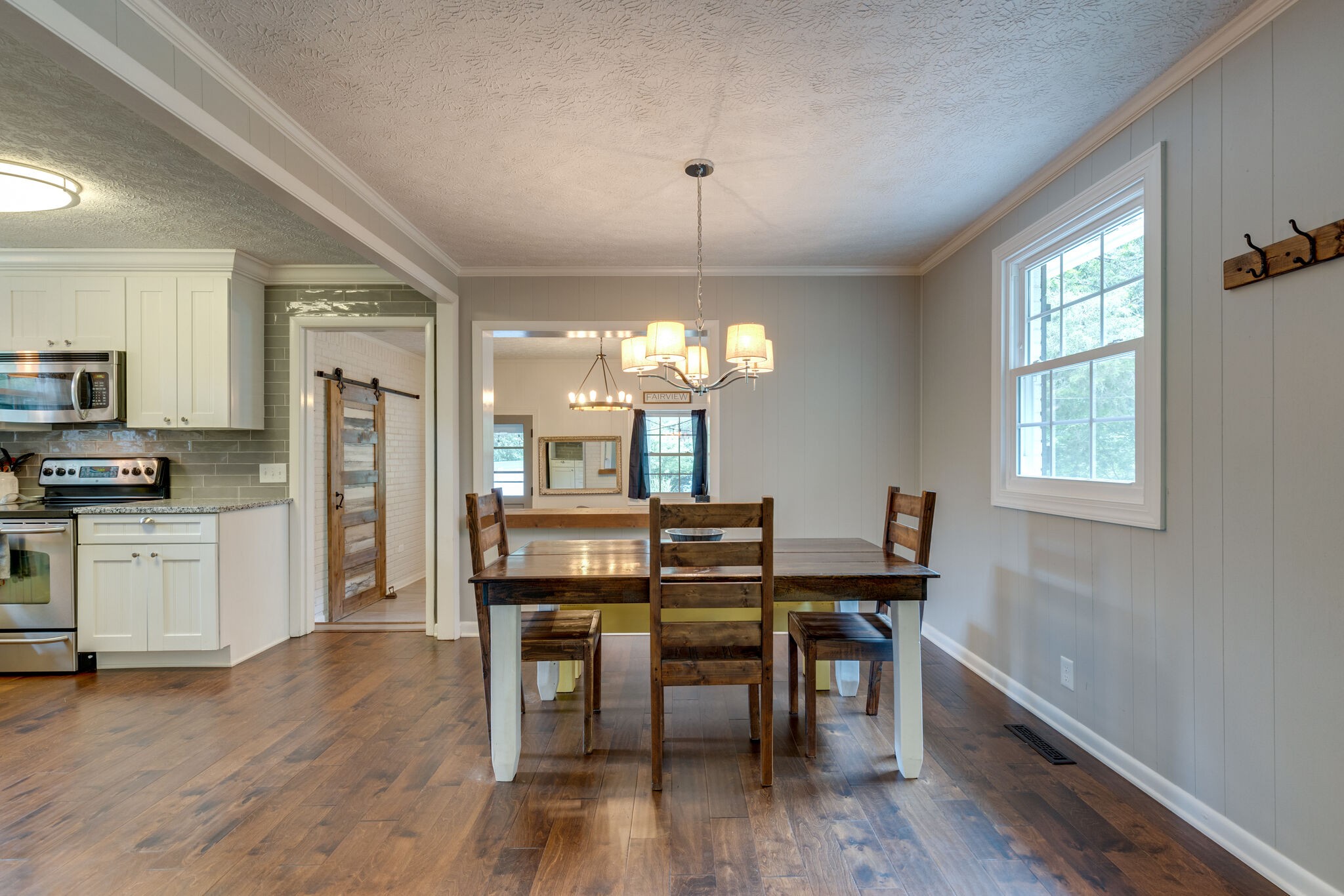 7316 Chester Road Fairview, TN 37062 - Photo 5 of 29 a view of a dining room with furniture window and wooden floor