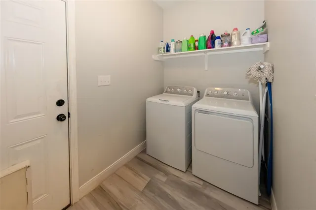 a utility room with dryer and washer