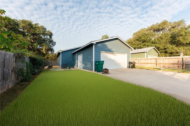 a house view with a garden space