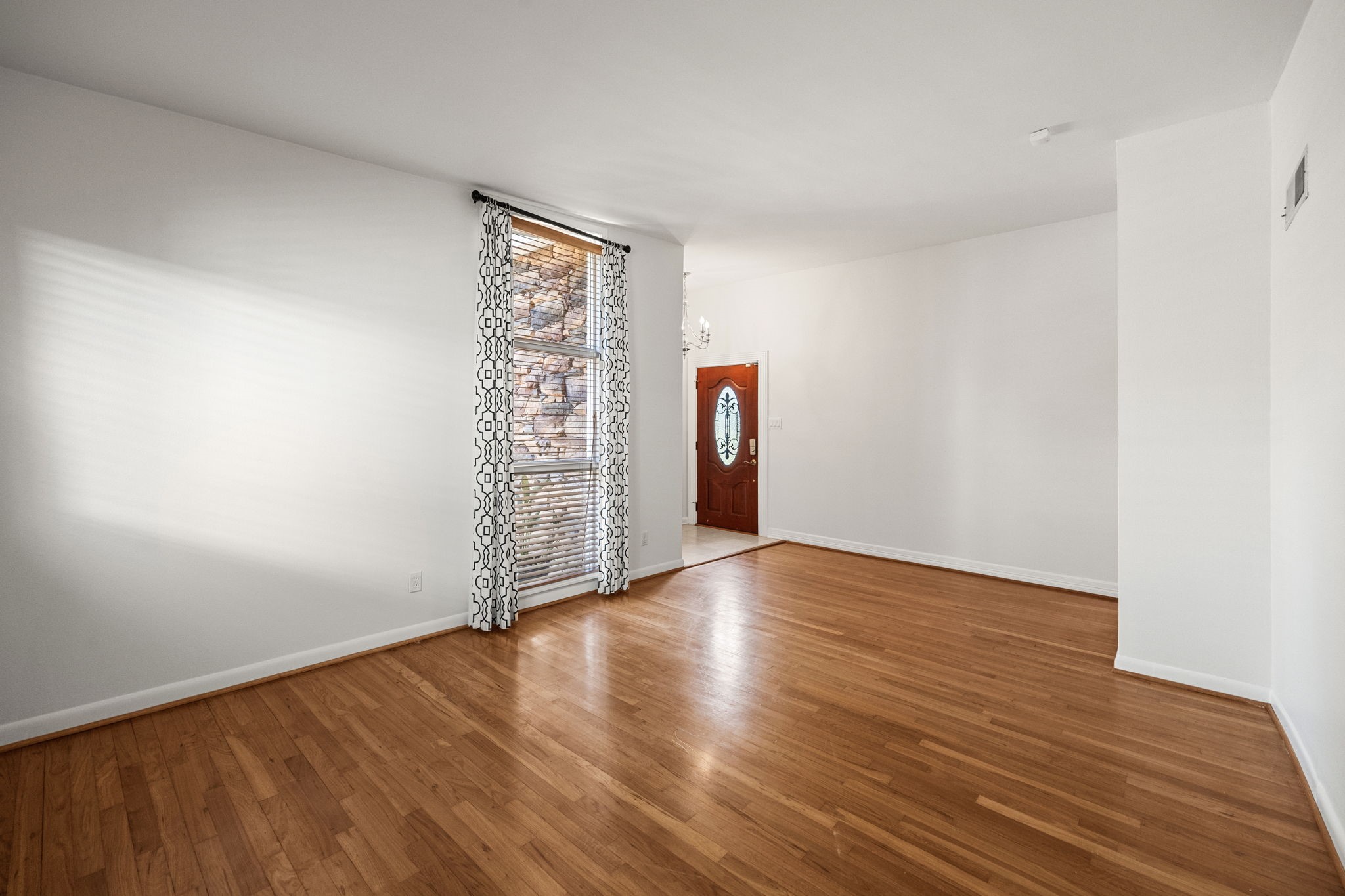 10310 Mayfield Road Houston, TX 77043 - Photo 11 of 49 Formal living room has wood flooring