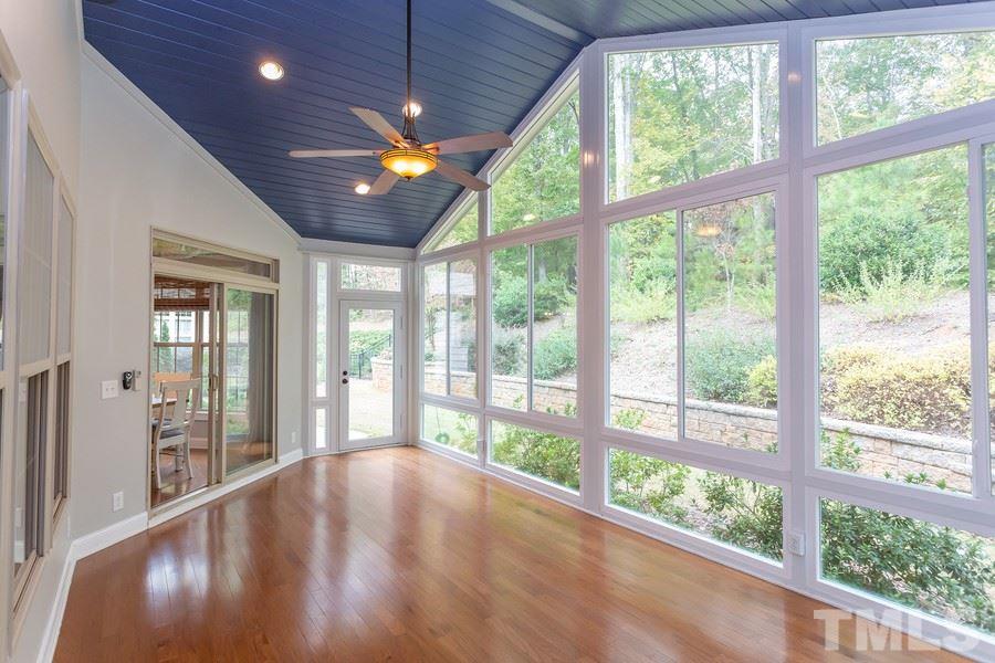12816 Edsel Drive Raleigh, NC 27613 - Photo 11 of 25 a view of a livingroom with furniture wooden floor and windows