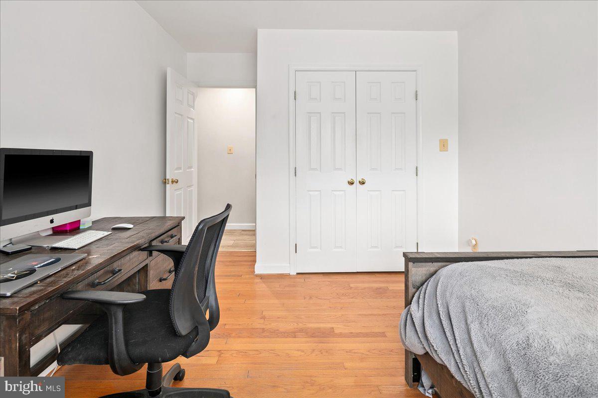 3012 Russell Road Alexandria, VA 22305 - Photo 28 of 56 a bedroom with a bed and a flat screen tv