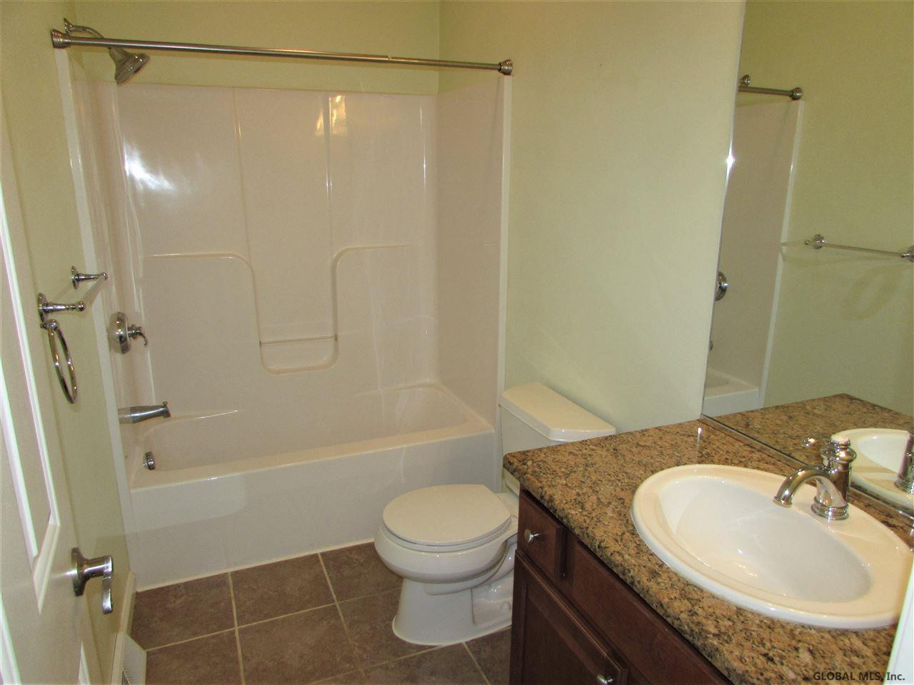 1001 Reynolds Road Princetown, NY 12306 - Photo 13 of 27 Tile floor, granite topped vanity