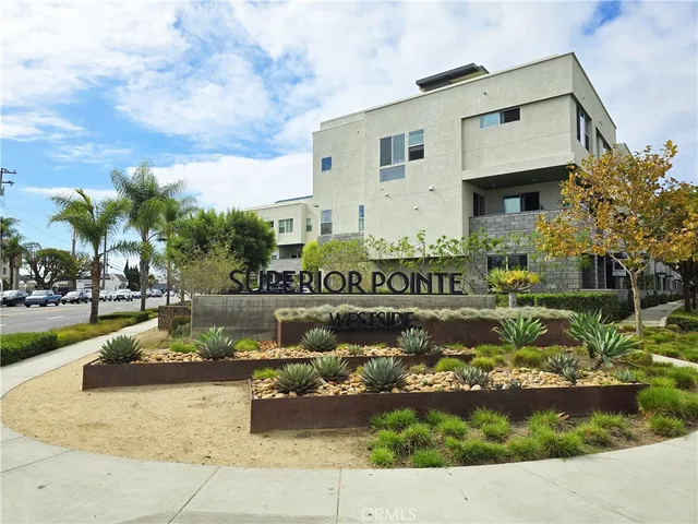 a view of a house with a iron stairs