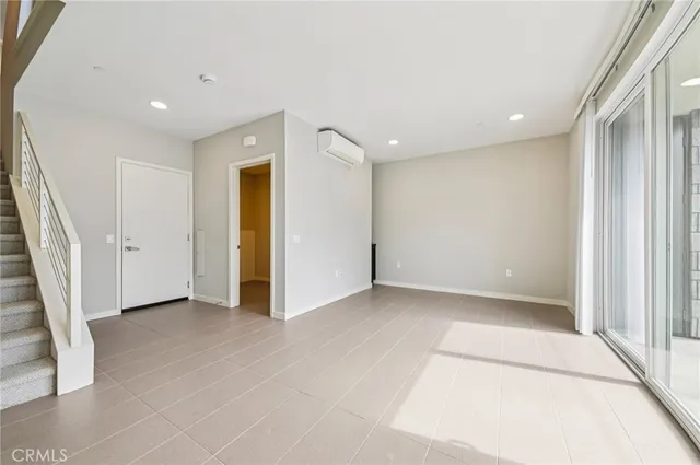 a bathroom with a toilet sink and shower