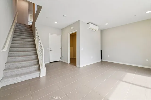 a bathroom with a shower and a shower in a glass window