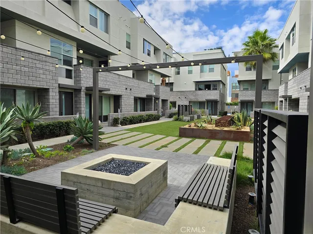 a kitchen with stainless steel appliances kitchen island granite countertop a large counter top and oven