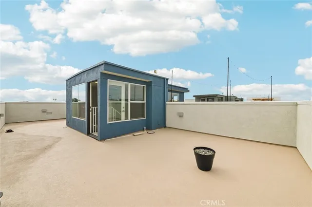 a front view of a building with a street