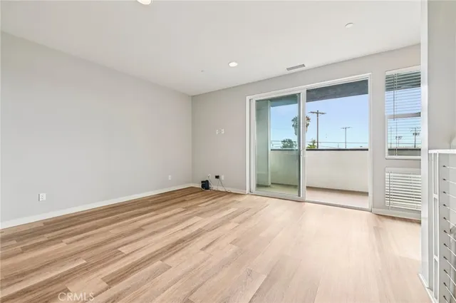 a view of kitchen and kitchen with furniture