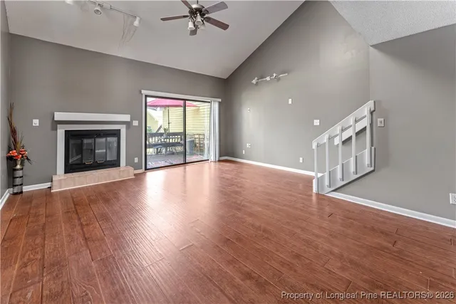 a view of staircase and kitchen with sink