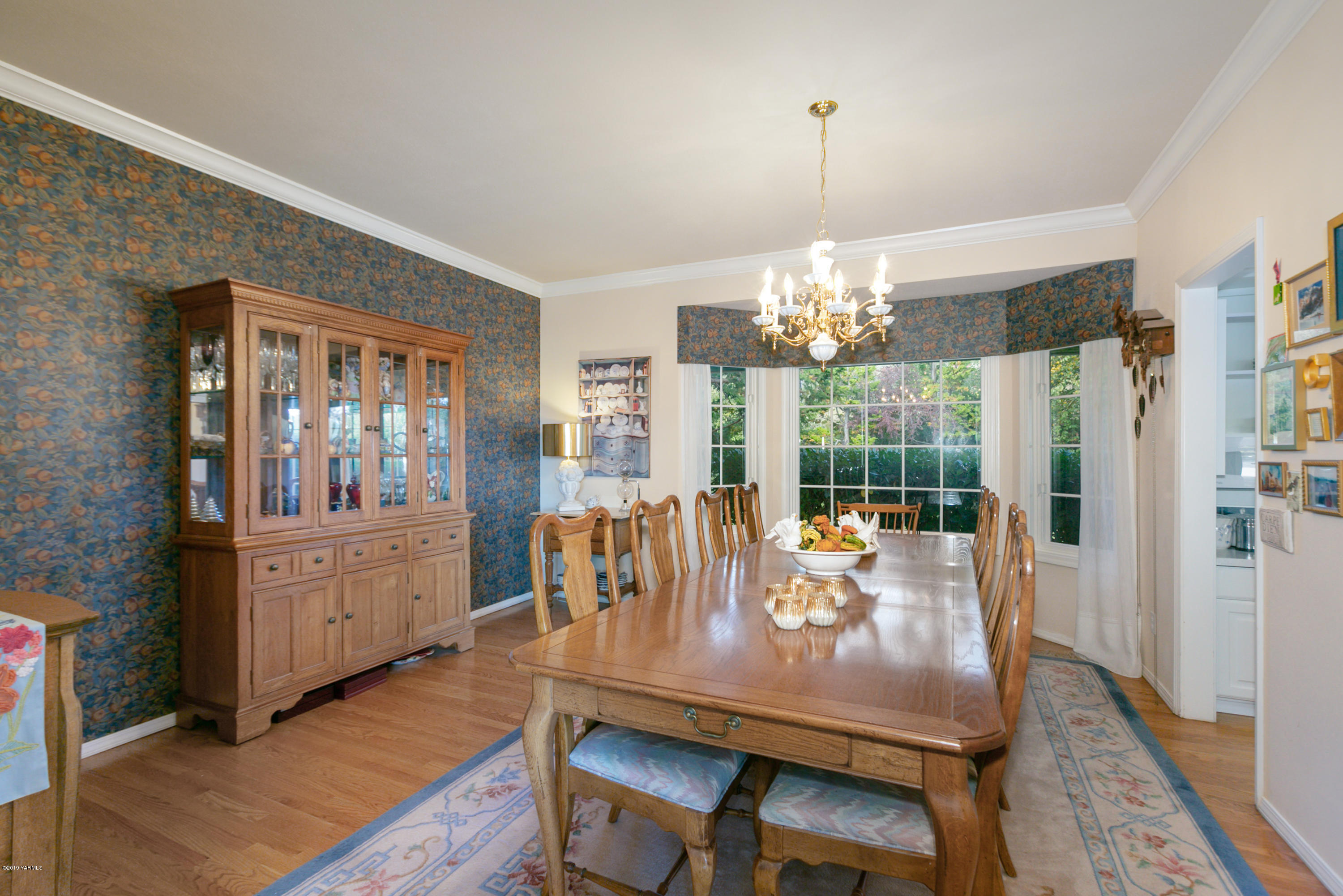 14771 Summitview Ext Road Yakima, WA 98908 - Photo 17 of 45 a view of a dining room with furniture wooden floor and chandelier