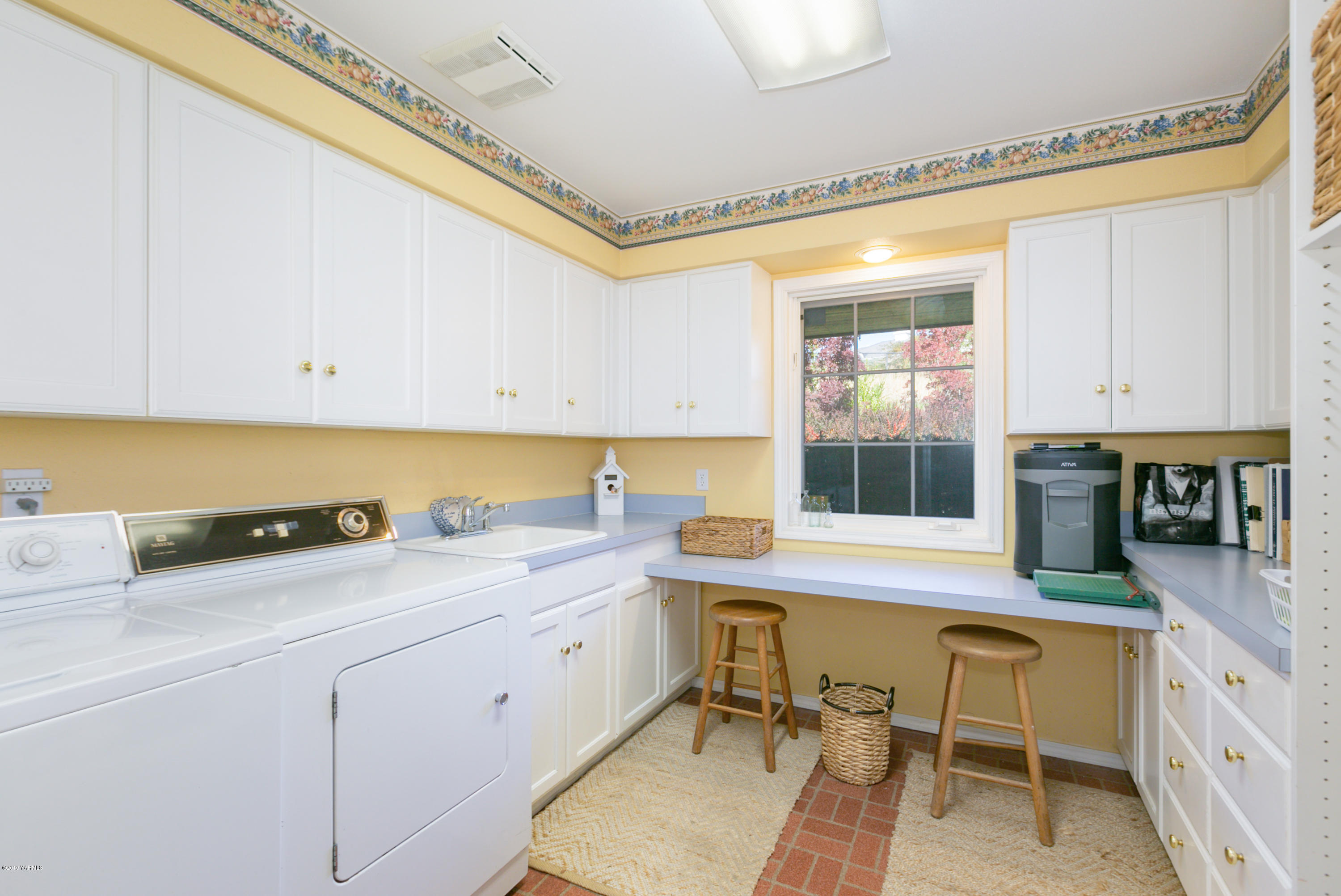 14771 Summitview Ext Road Yakima, WA 98908 - Photo 26 of 45 a kitchen with a sink cabinets and window
