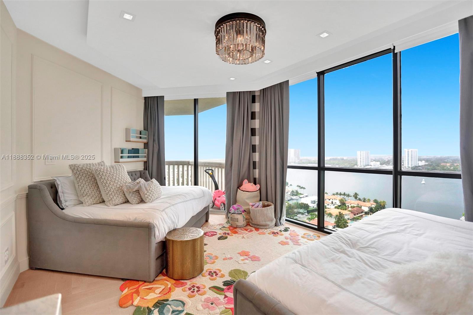 2000 Island Boulevard, Unit 2207 Aventura, FL 33160 - Photo 6 of 29 a bedroom with a bed and a large window