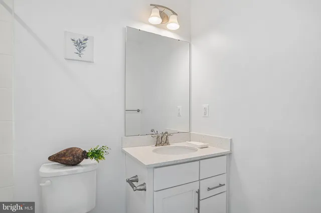 a view of a hallway with washer and dryer