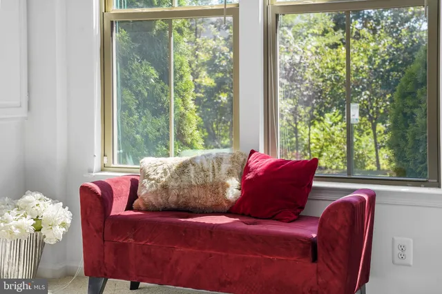 a furnished livingroom and entryway