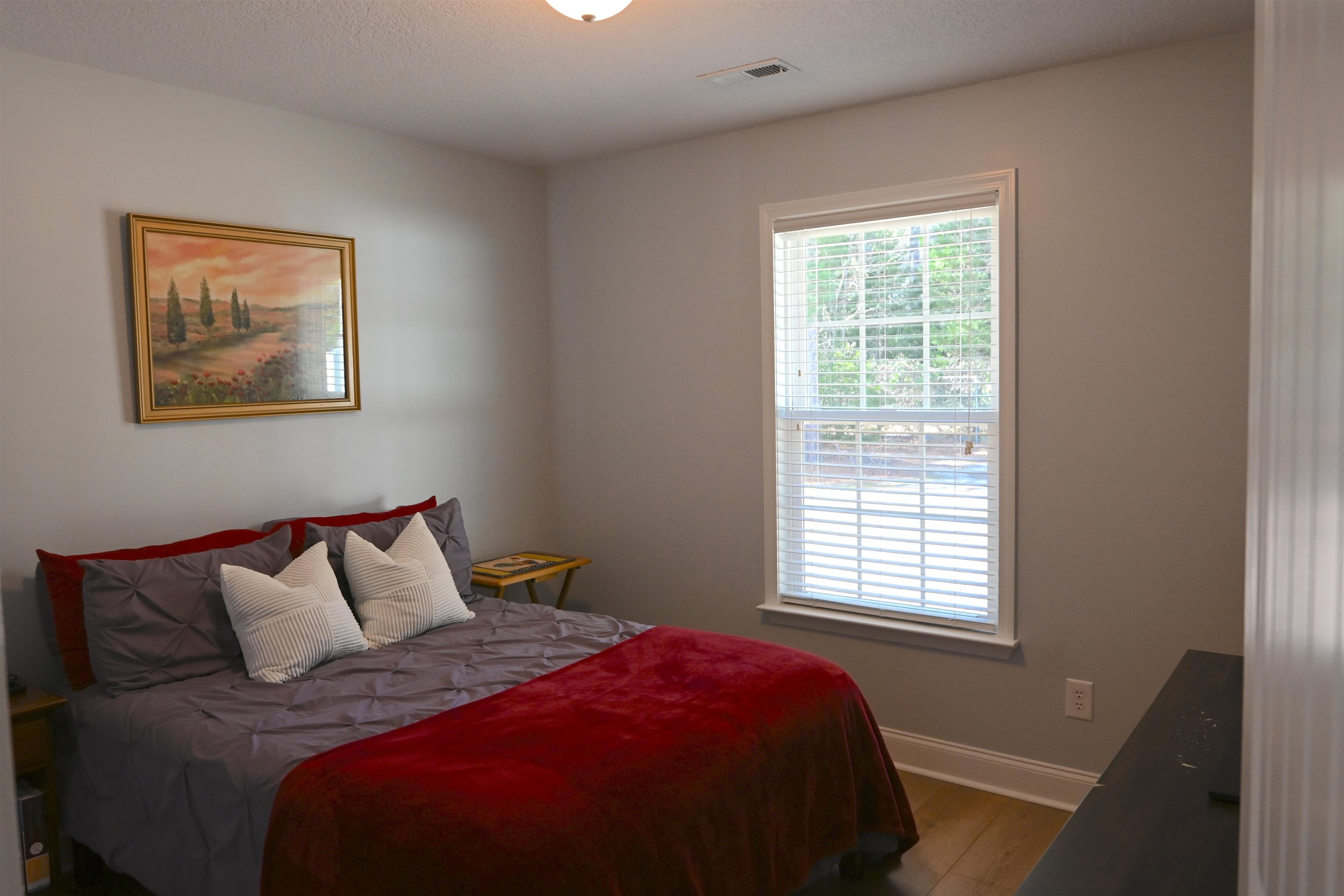 233 Macarthur Drive Conway, SC 29527 - Photo 17 of 21 Bedroom with wood finished floors and a textured ceiling