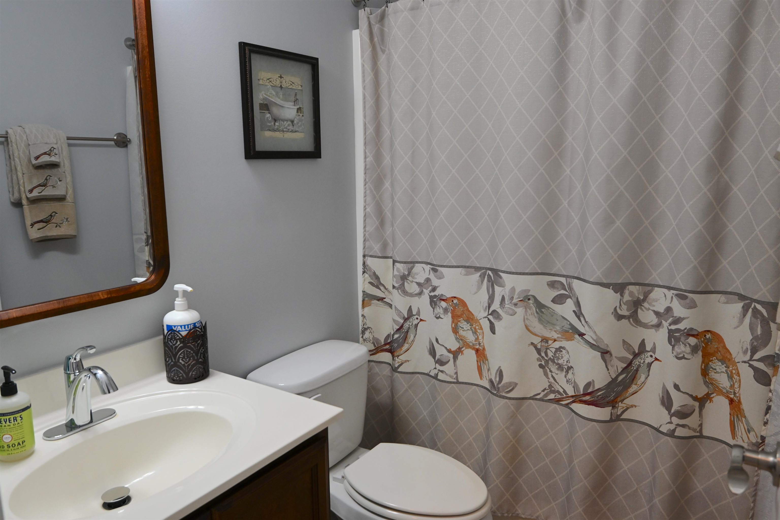 233 Macarthur Drive Conway, SC 29527 - Photo 18 of 21 Full bathroom featuring curtained shower and vanity