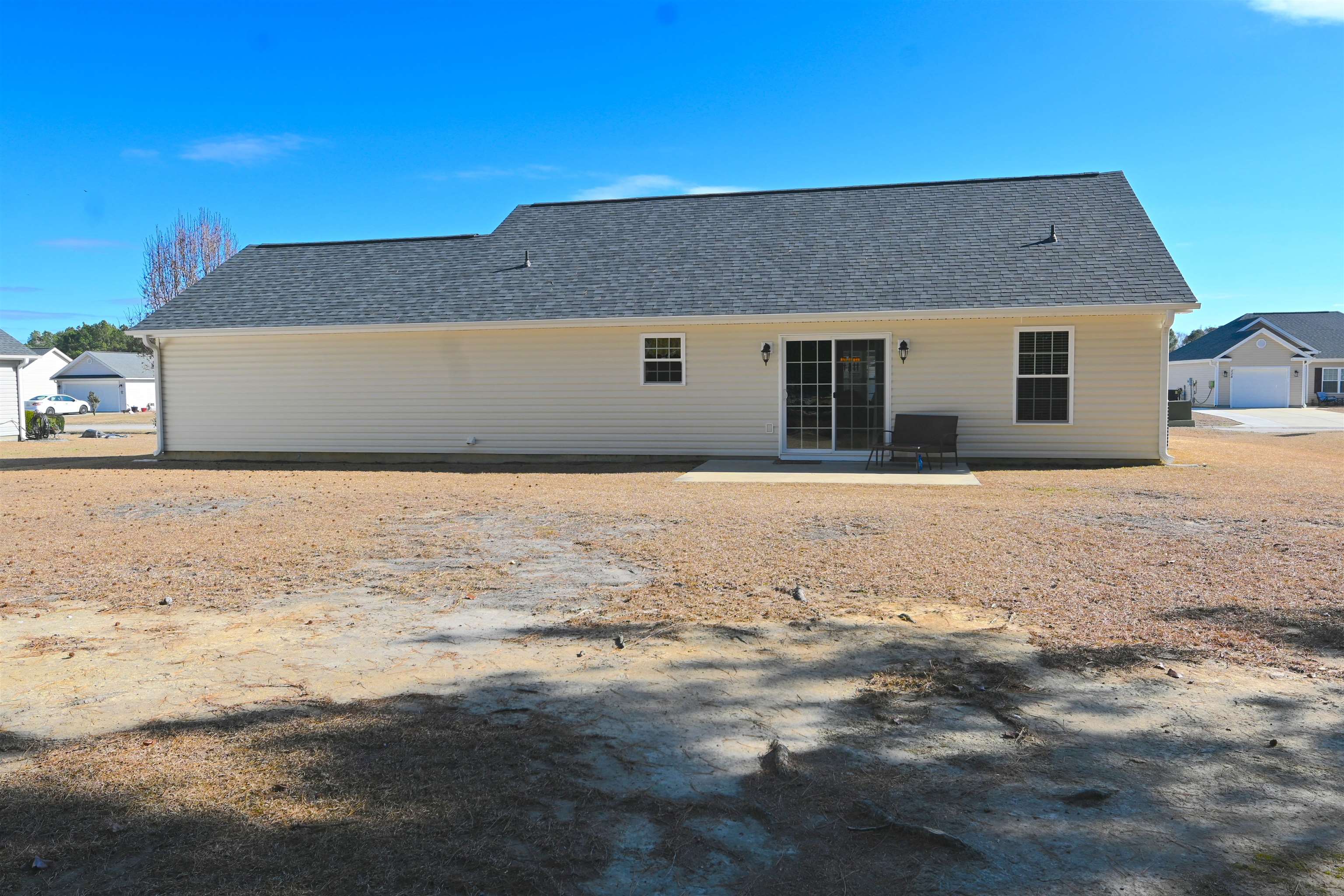 233 Macarthur Drive Conway, SC 29527 - Photo 21 of 21 Rear view of house featuring a patio and a shingled roof