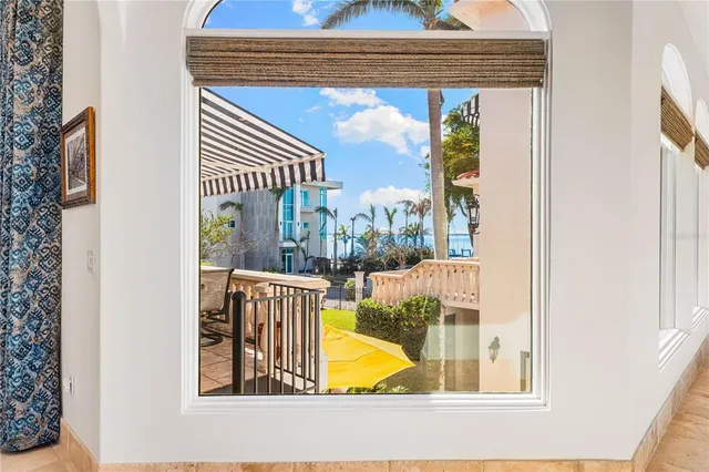a dining room with furniture and a window
