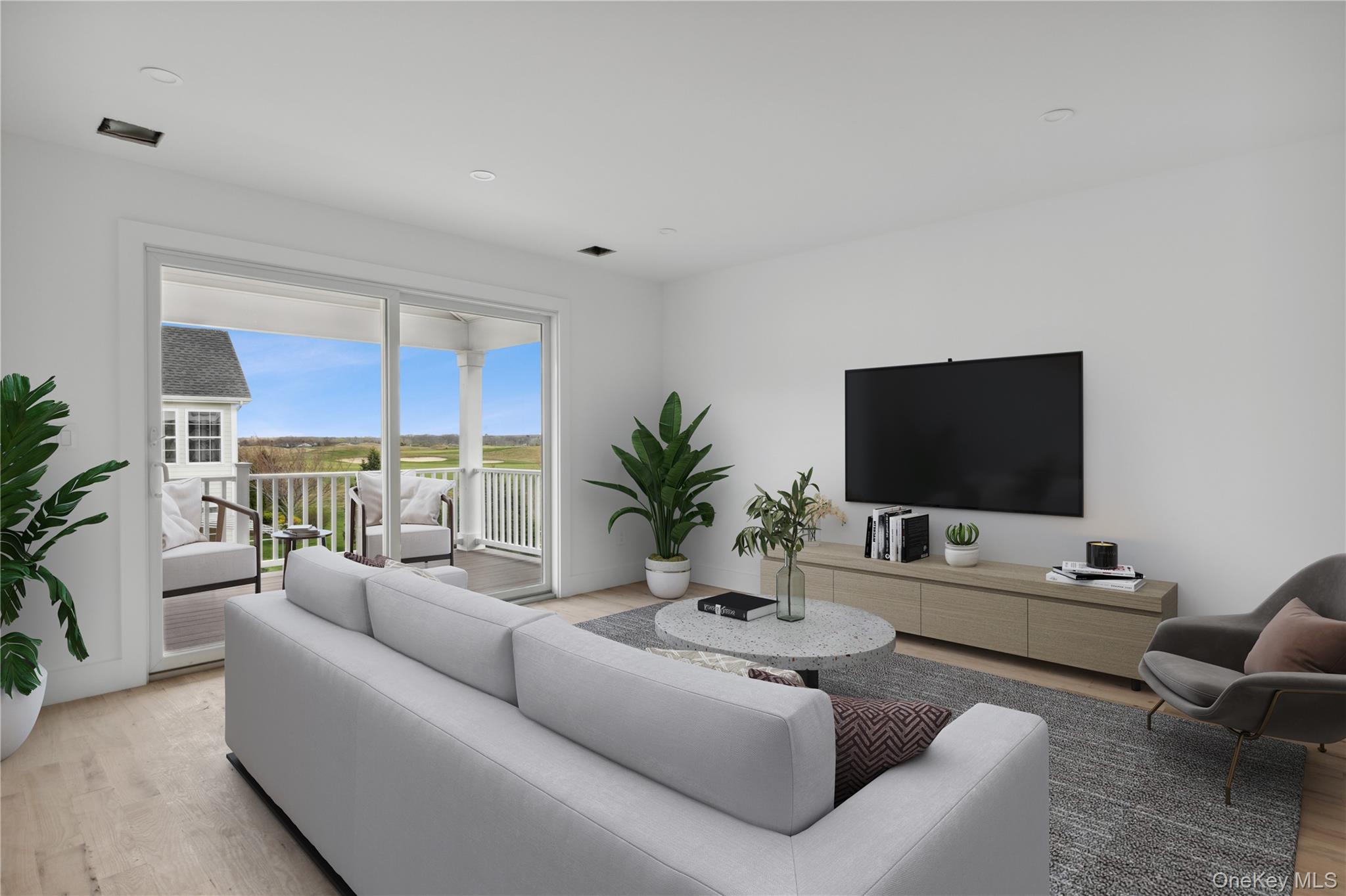 74 Tyler Drive Riverhead, NY 11901 - Photo 17 of 23 Living room featuring recessed lighting and light wood-style floors