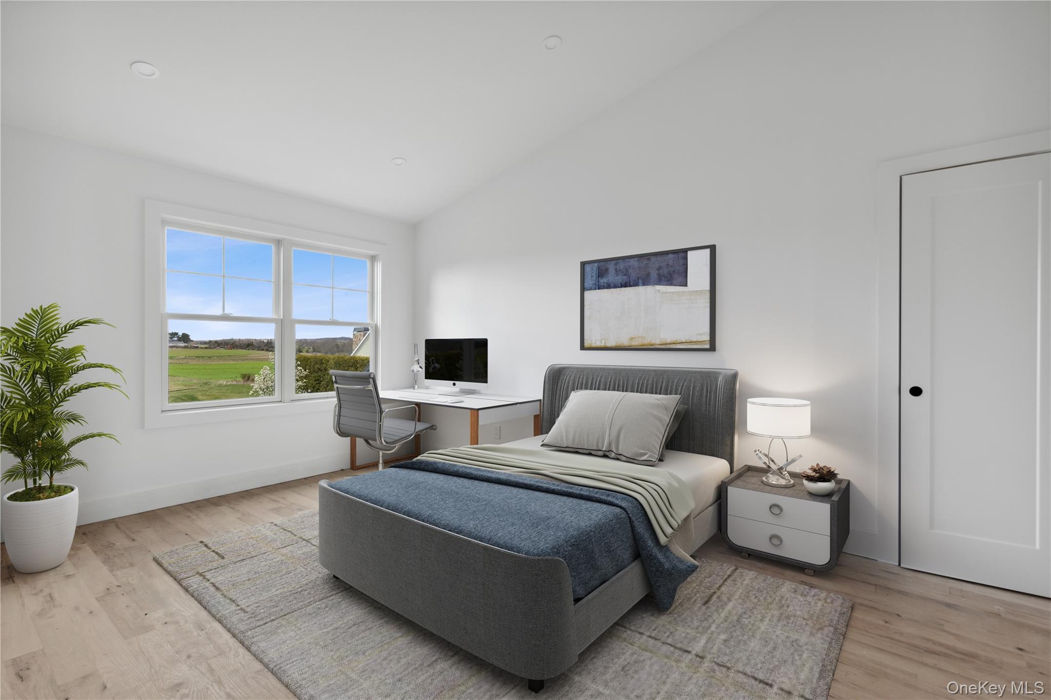 74 Tyler Drive Riverhead, NY 11901 - Photo 19 of 23 Bedroom with high vaulted ceiling, baseboards, and wood finished floors