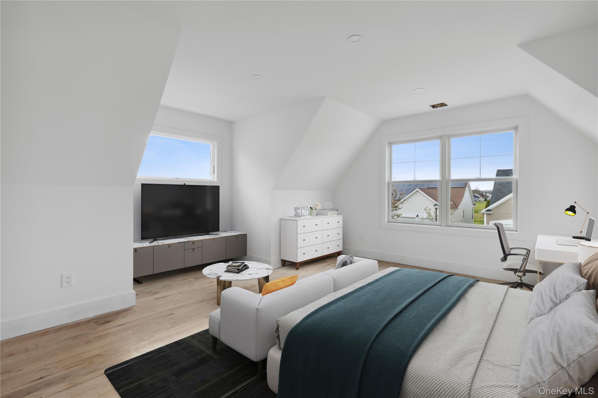 74 Tyler Drive Riverhead, NY 11901 - Photo 20 of 23 Bedroom featuring lofted ceiling, light wood-style floors, and baseboards