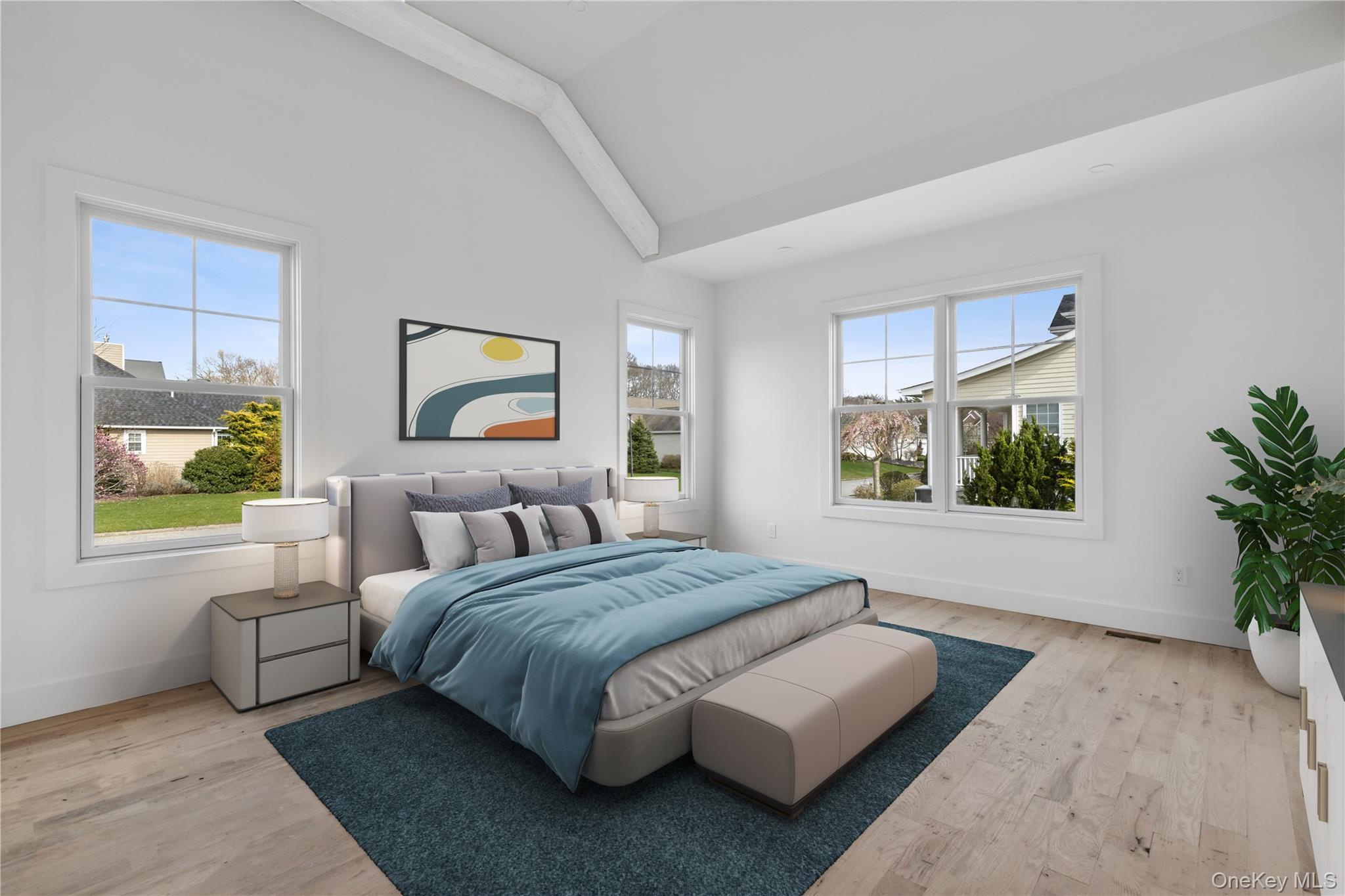 74 Tyler Drive Riverhead, NY 11901 - Photo 10 of 23 Bedroom with lofted ceiling, wood finished floors, and multiple windows