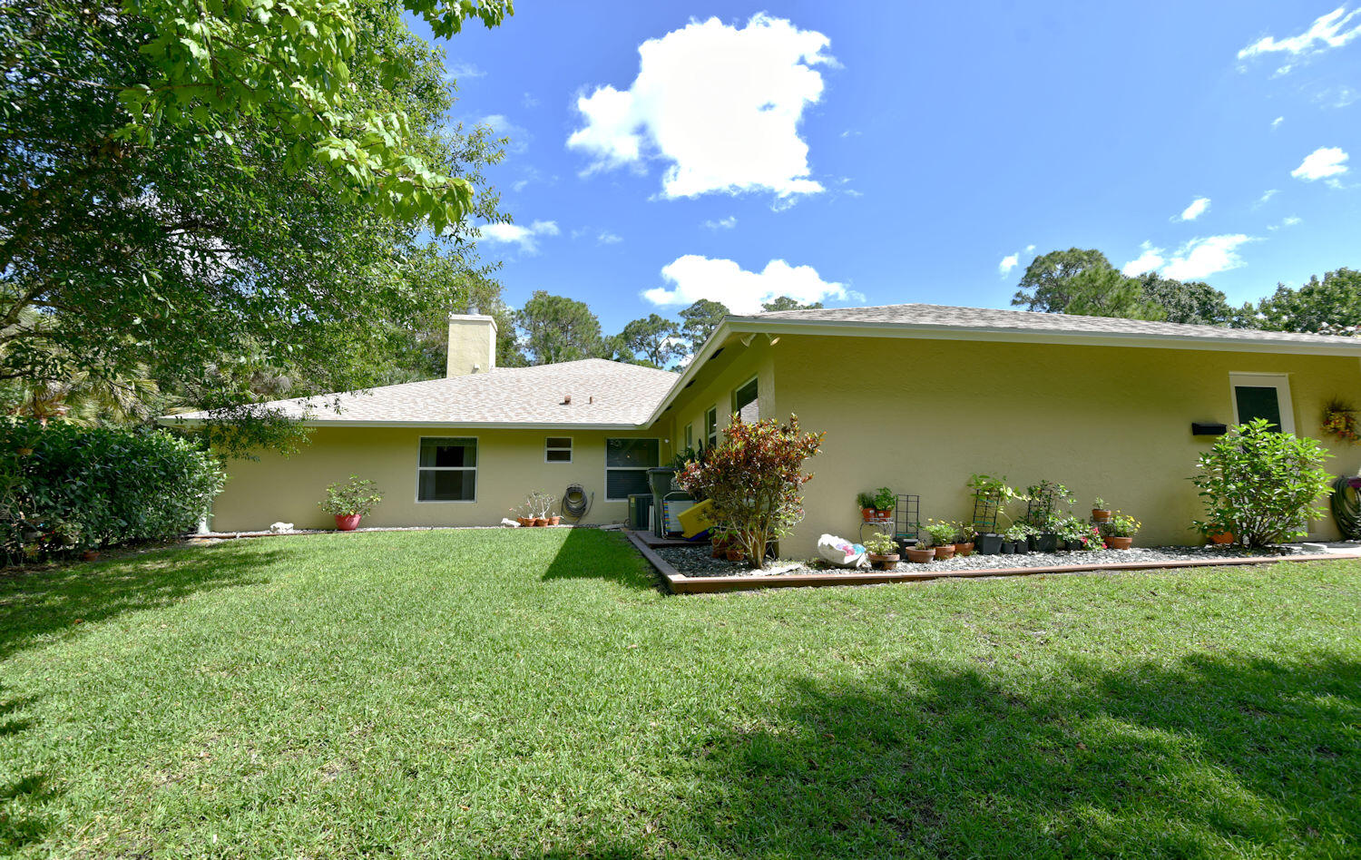 17861 Winterhawk Trail Jupiter, FL 33478 - Photo 52 of 64 Game Room - Side Yard