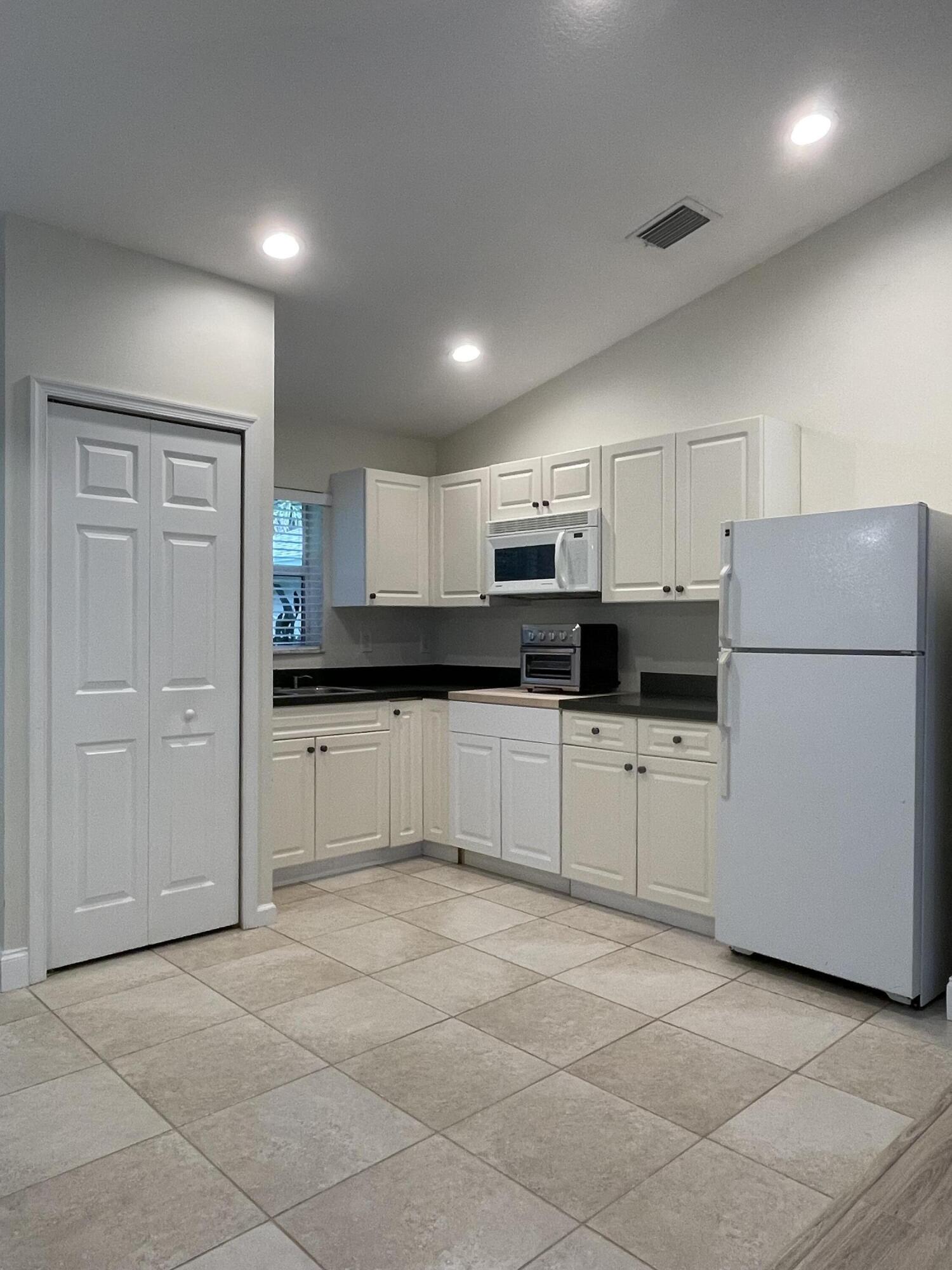 17861 Winterhawk Trail Jupiter, FL 33478 - Photo 55 of 64 Game Room - Kitchenette