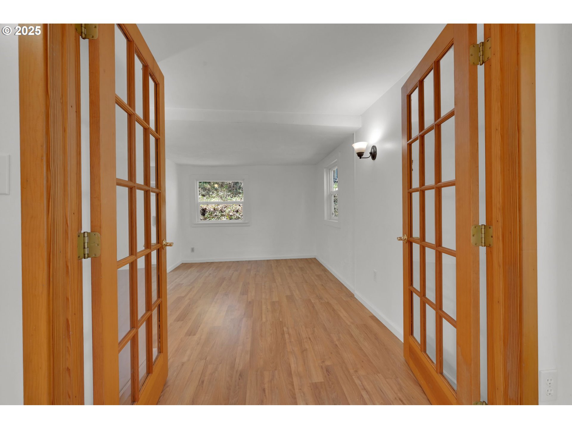 22 Prall Lane Eugene, OR 97405 - Photo 17 of 43 a view of an entryway with wooden floor