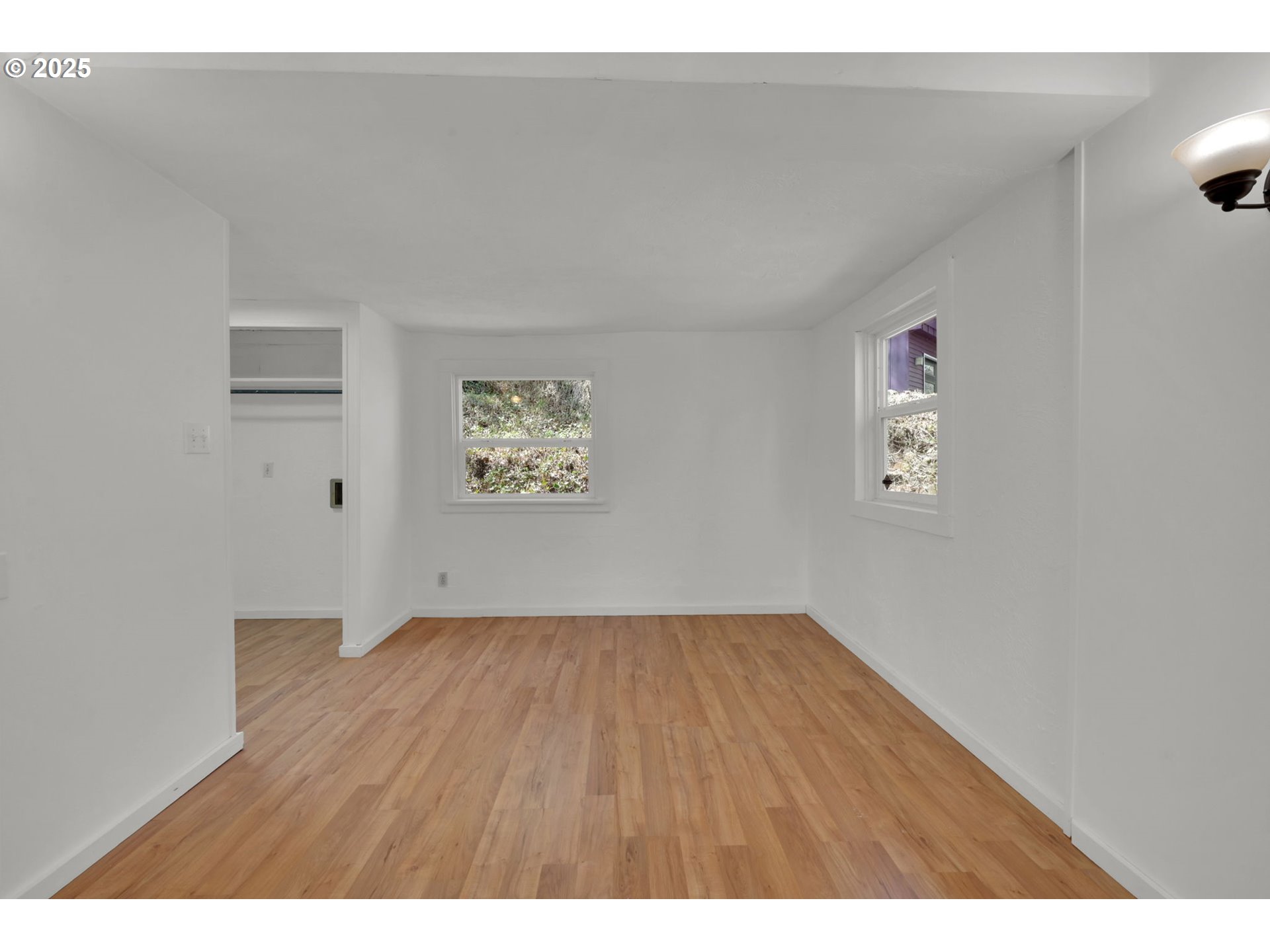 22 Prall Lane Eugene, OR 97405 - Photo 18 of 43 a view of an empty room and wooden floor