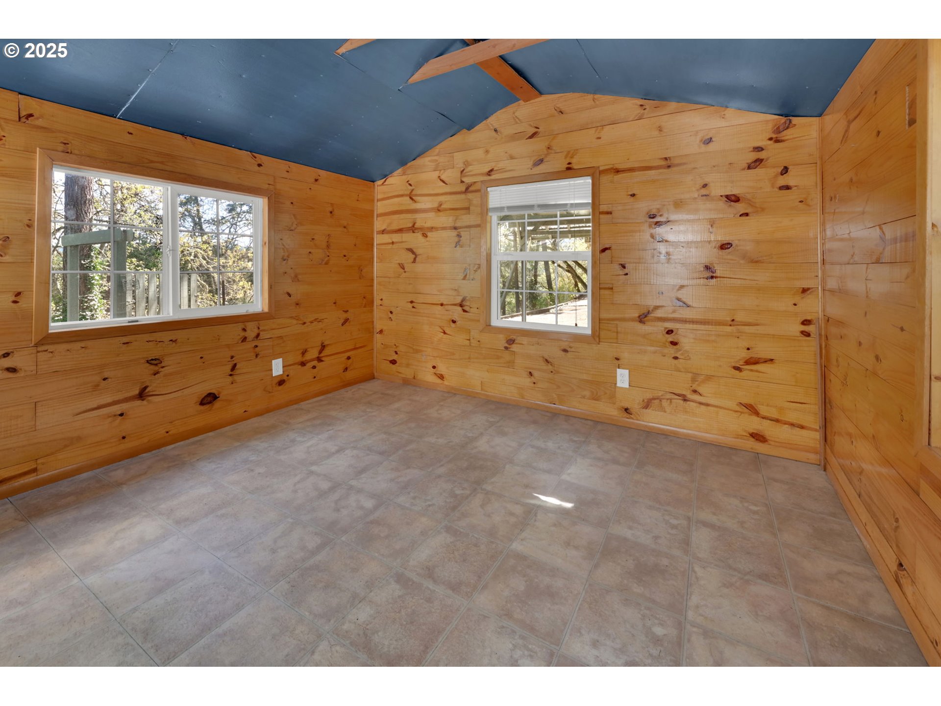 22 Prall Lane Eugene, OR 97405 - Photo 32 of 43 a view of an empty room with windows