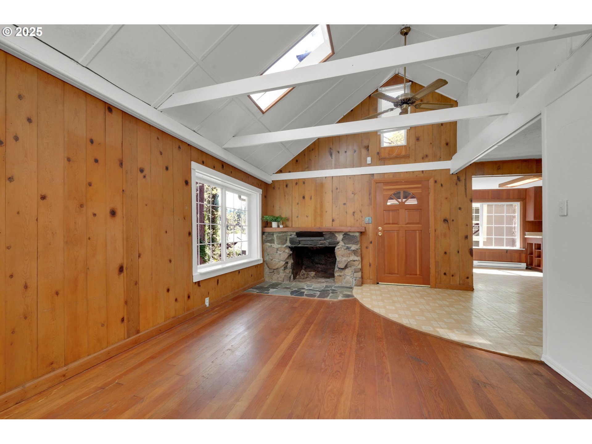 22 Prall Lane Eugene, OR 97405 - Photo 5 of 43 a view of an empty room with a fireplace and a window