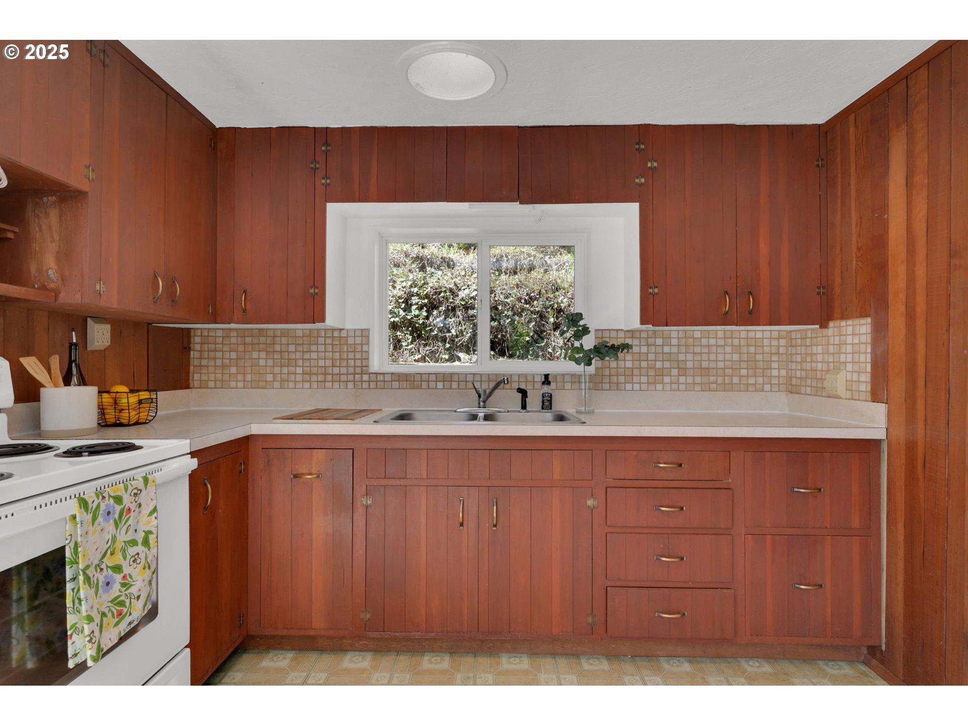 22 Prall Lane Eugene, OR 97405 - Photo 10 of 43 a kitchen with a sink and cabinets
