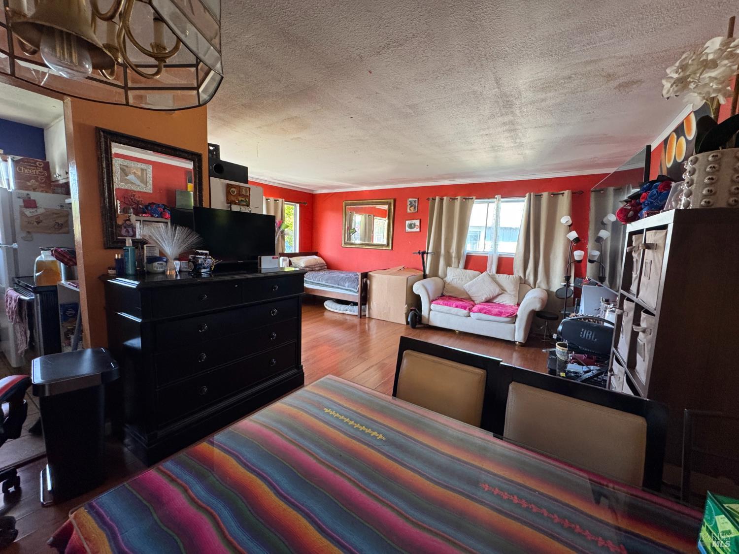 431 Bahia Way San Rafael, CA 94901 - Photo 15 of 46 a living room with furniture a flat screen tv and a fireplace