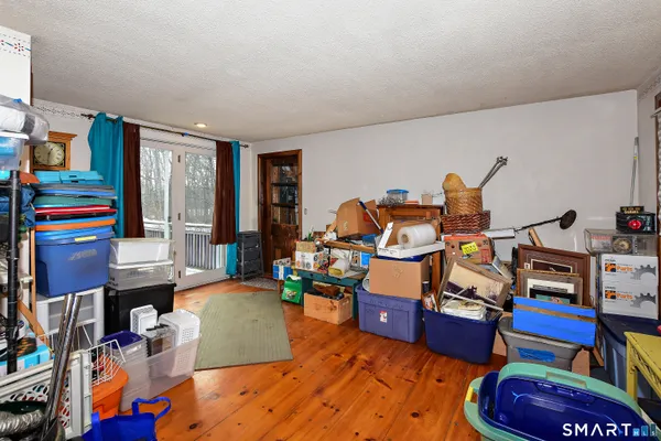 a room with furniture and a wooden floor
