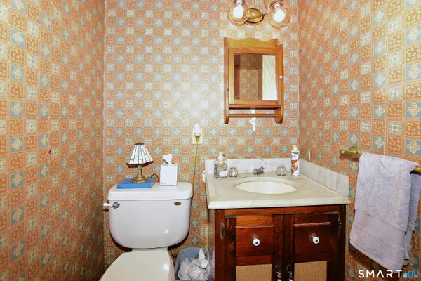 a bathroom with a sink and a toilet