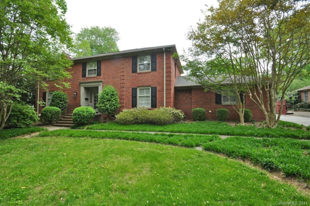 1931 Providence Road Charlotte, NC 28211 - Photo 1 of 22 a front view of a house with a yard