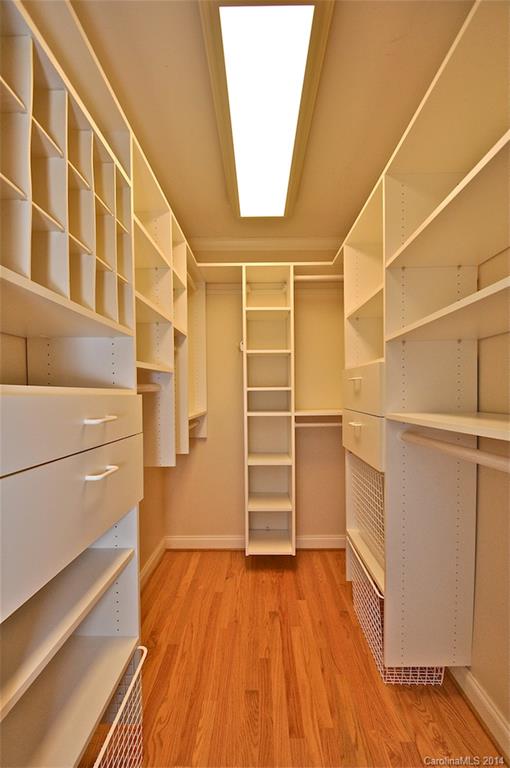 1931 Providence Road Charlotte, NC 28211 - Photo 16 of 22 a view of walk in closet with empty racks